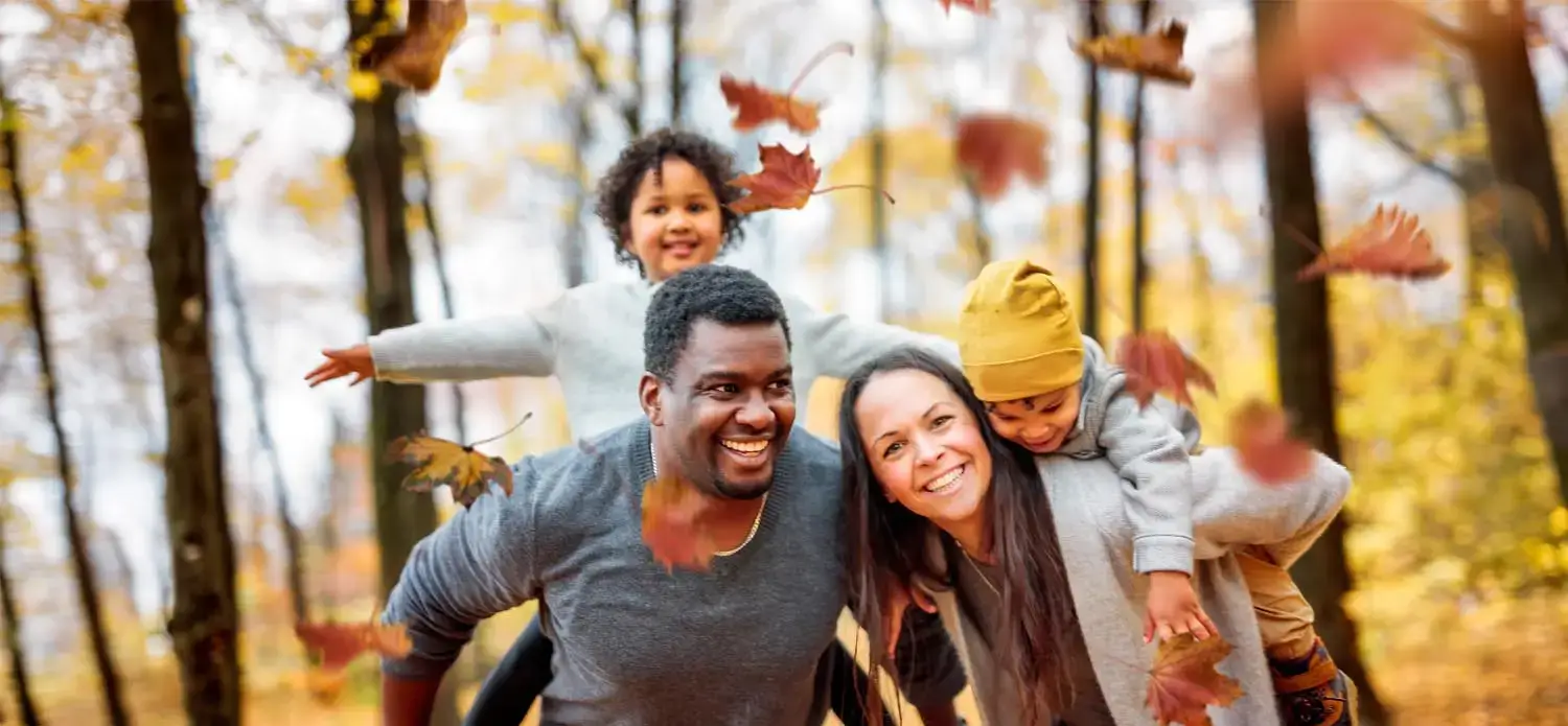 A family enjoying fall at the Y